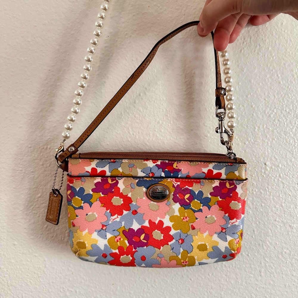 Coach floral wristlet/minicrossbody
